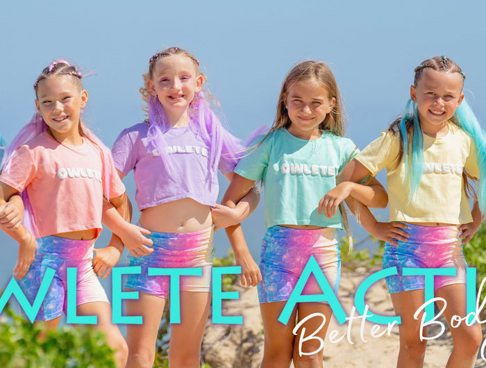 owlete active girls together for a beach photo shoot wearing kids activewear