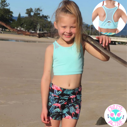 owlete active flamingo print shorts for girls to wear to gymnastics with a phone sized pocket
