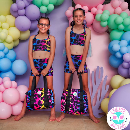 kool leopard print gym bag for girls with rainbow details in pink purple blue yellow black from owlete active great birthday gift for girls