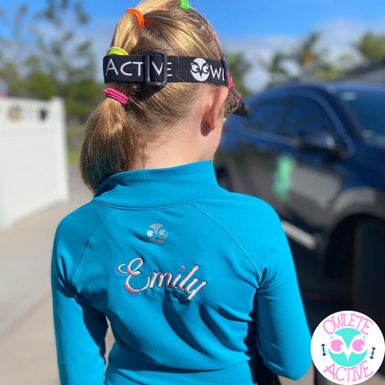 owlete active teal jacket with personalisation customised name embroided on the back of the jacket for the perfect gift