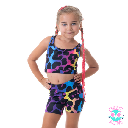 owlete active wear sets of shorts and crops with vibrant rainbow colour pallet and leopard spots 